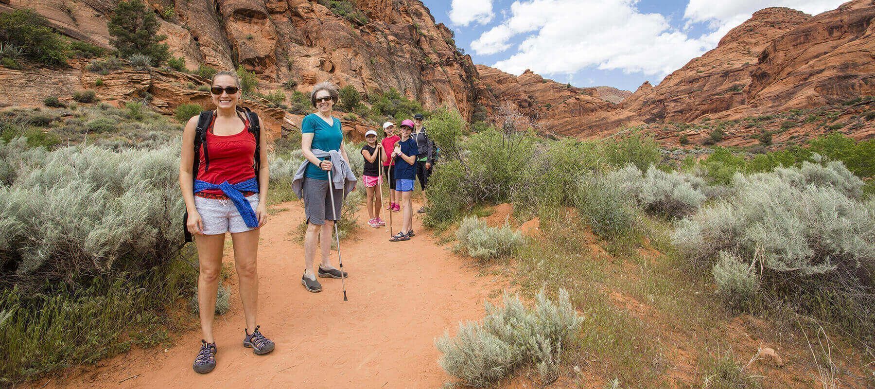 Donate Body to Science banner with group of people hiking through a valley.